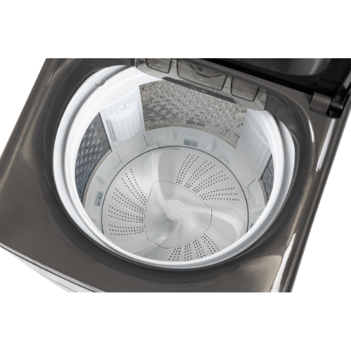 Washing machine drum with clothes inside on a white background